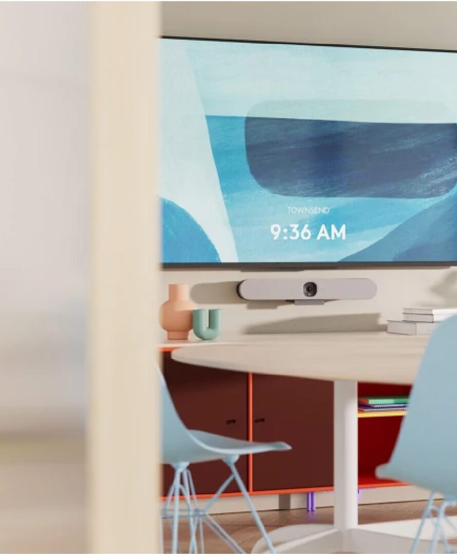 conference room table and large meeting screen, link to meeting room page